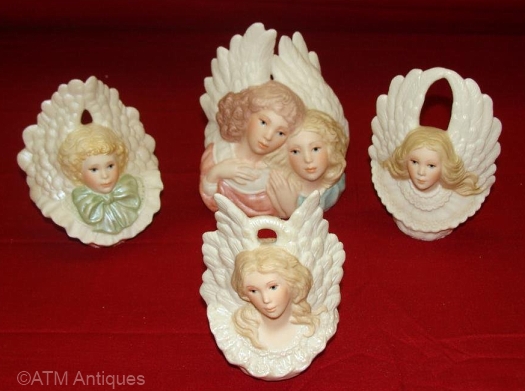 four annual ANGEL ORNAMENTS by Cybis