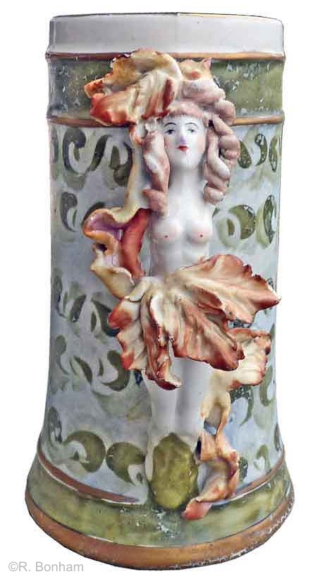 female handle mug with autumn leaves and green accents by Cybis 1950s view 1