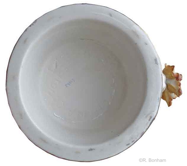 female handle mug with autumn leaves and green accents signature