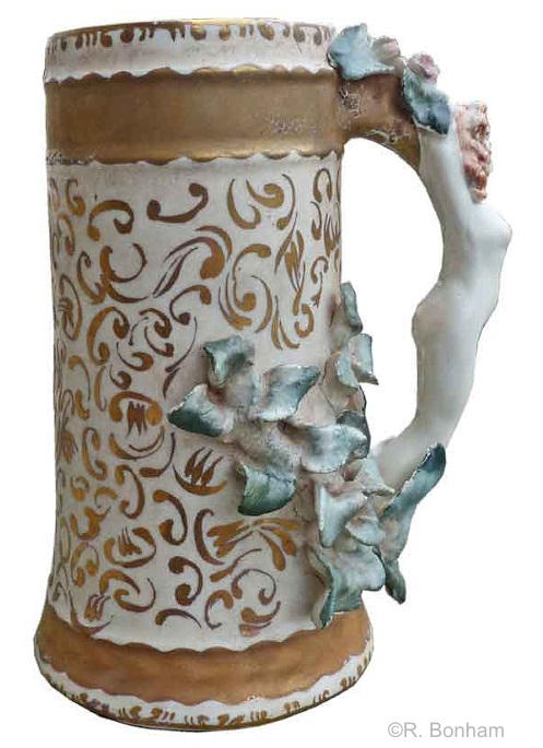 female handle mug with teal leaves and gilt accents by Cybis 1950s view 2