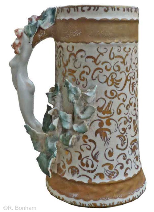 female handle mug with teal leaves and gilt accents by Cybis 1950s view 3